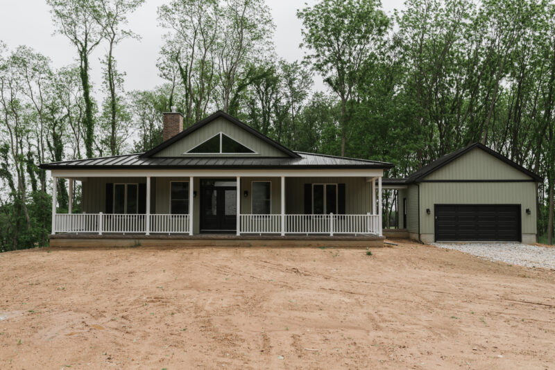 Portfolio Image - Modern cottage with board and batten exterior on a private lot